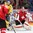 MOSCOW, RUSSIA - MAY 15: Switzerland's Reto Berra #20 attempts to make a glove save on this play while Sweden's Gustav Nyquist #14 looks on during preliminary round action at the 2016 IIHF Ice Hockey World Championship. (Photo by Andre Ringuette/HHOF-IIHF Images)

